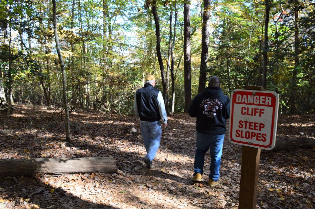 hikers and danger sign at Raven Rock State Park