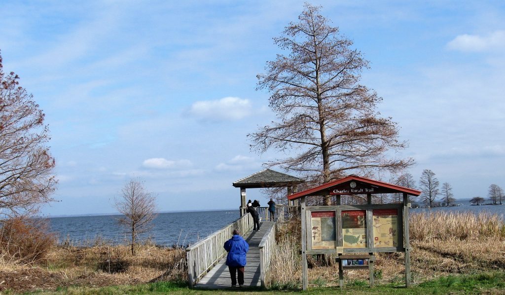 People at Charles Kuralt Trail kiosk at Mattamuskeet National Wildlife Refuge