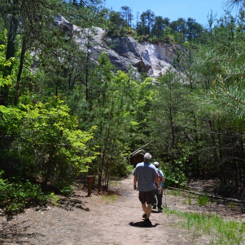 Man and woman entering quarry at Oconeechee State Natural Area, Hillsborough, North Carolina