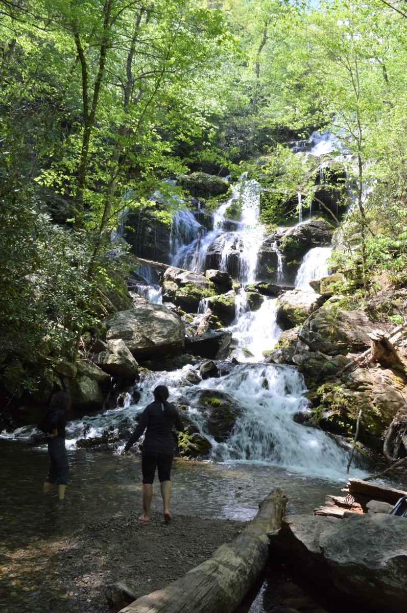 Women in water at foot of Catawba Falls near Old Fort, NC, in Pisgah National Forest