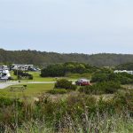 Campsites at Ocracoke Campground seen from beach access ramp at the Cape Hatteras National Seashore