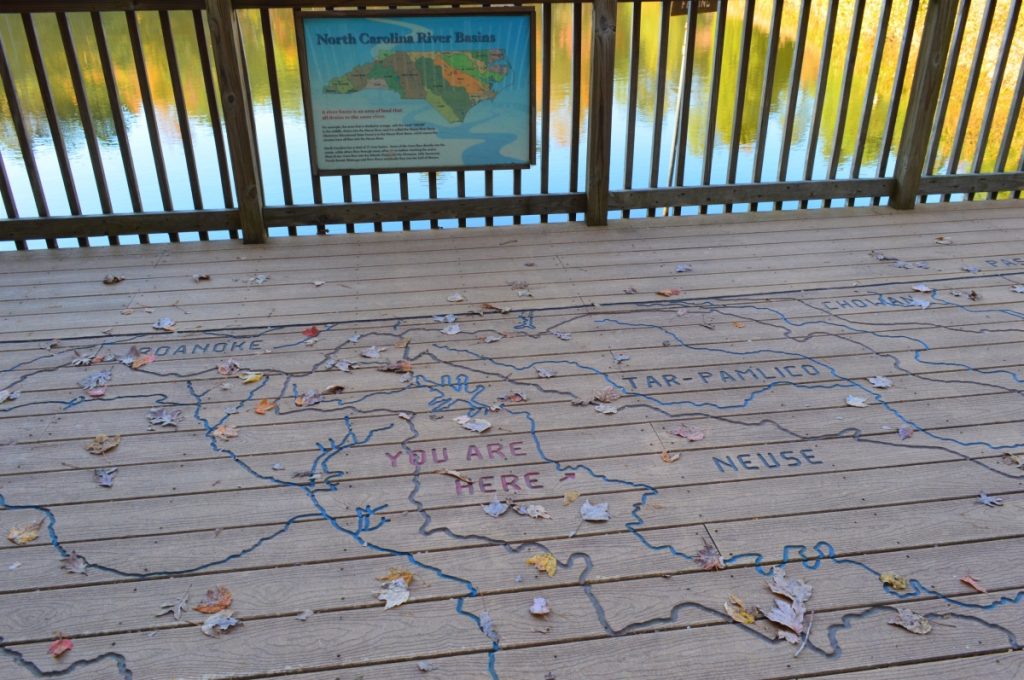 Deck and river basin map at Clemmons Educational State Forest