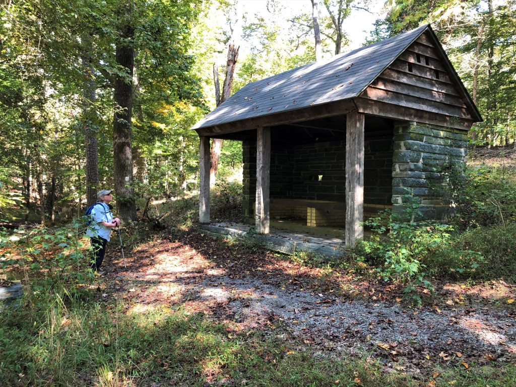 hiker and barbecue pit at Morrow Mountain State Park